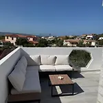 Casa Tanaunella Feriehus